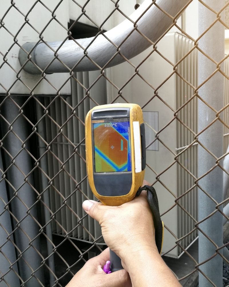 Photo of electrician conducting thermal testing