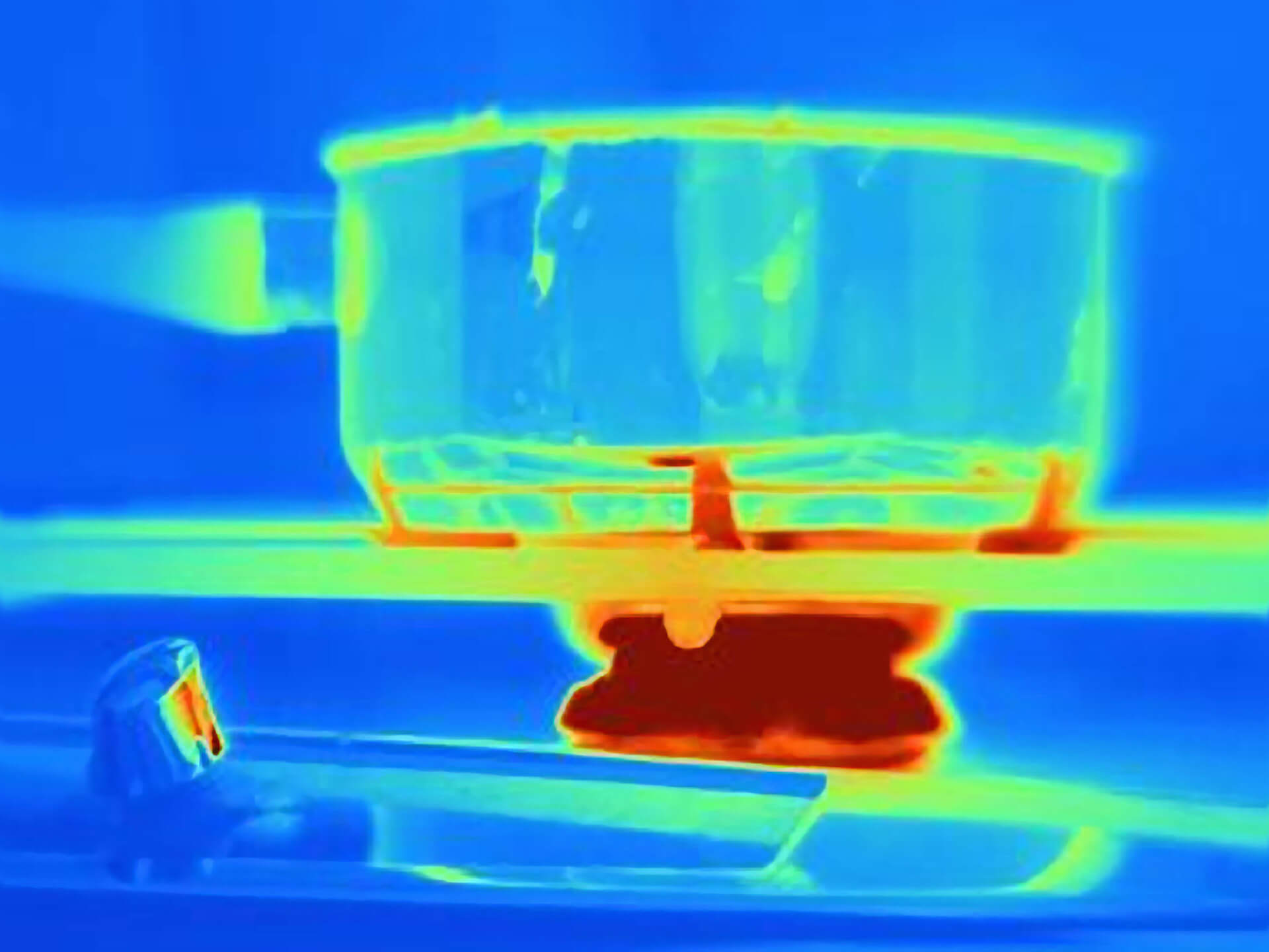 Picture of a thermal graphic image of a stove top